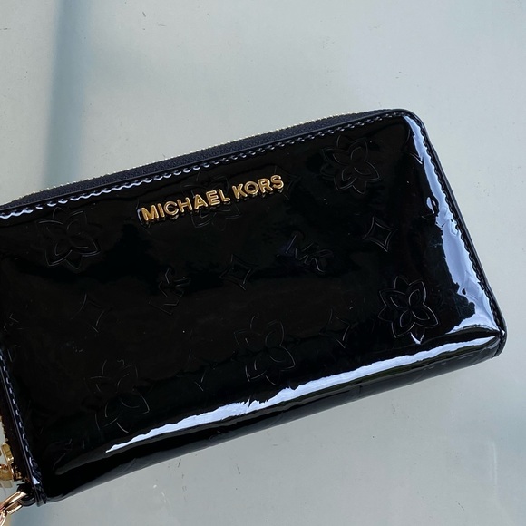 Michael Kors Handbags - NWT Michael Kors metallic LG MF phone Wallet black